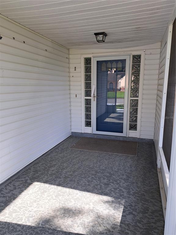 5618 Rosewall Circle Leesburg, FL 34748 - Photo 2 of 29 a view of a house with a yard