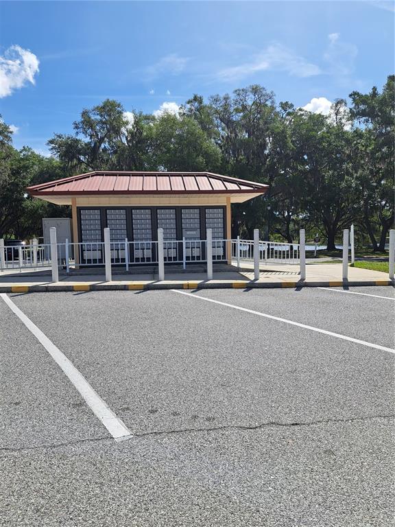 5618 Rosewall Circle Leesburg, FL 34748 - Photo 29 of 29 a view of a building and a yard