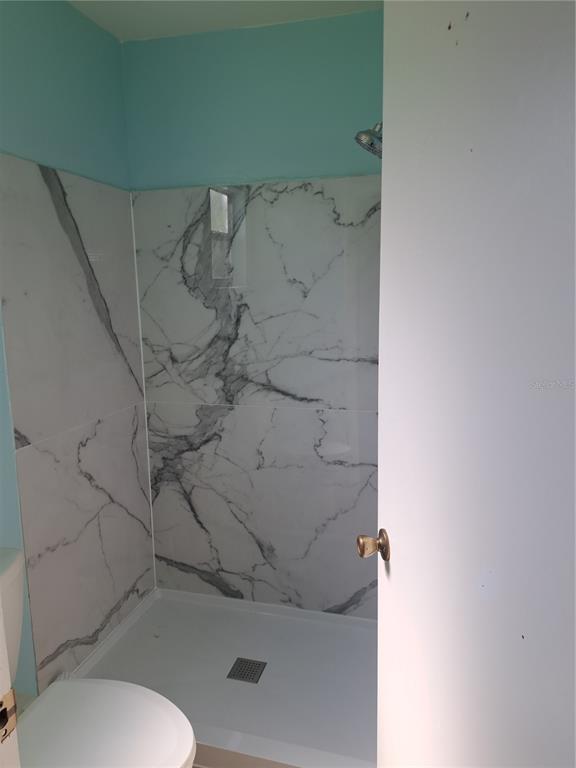 5618 Rosewall Circle Leesburg, FL 34748 - Photo 9 of 29 a bathroom with a sink and toilet