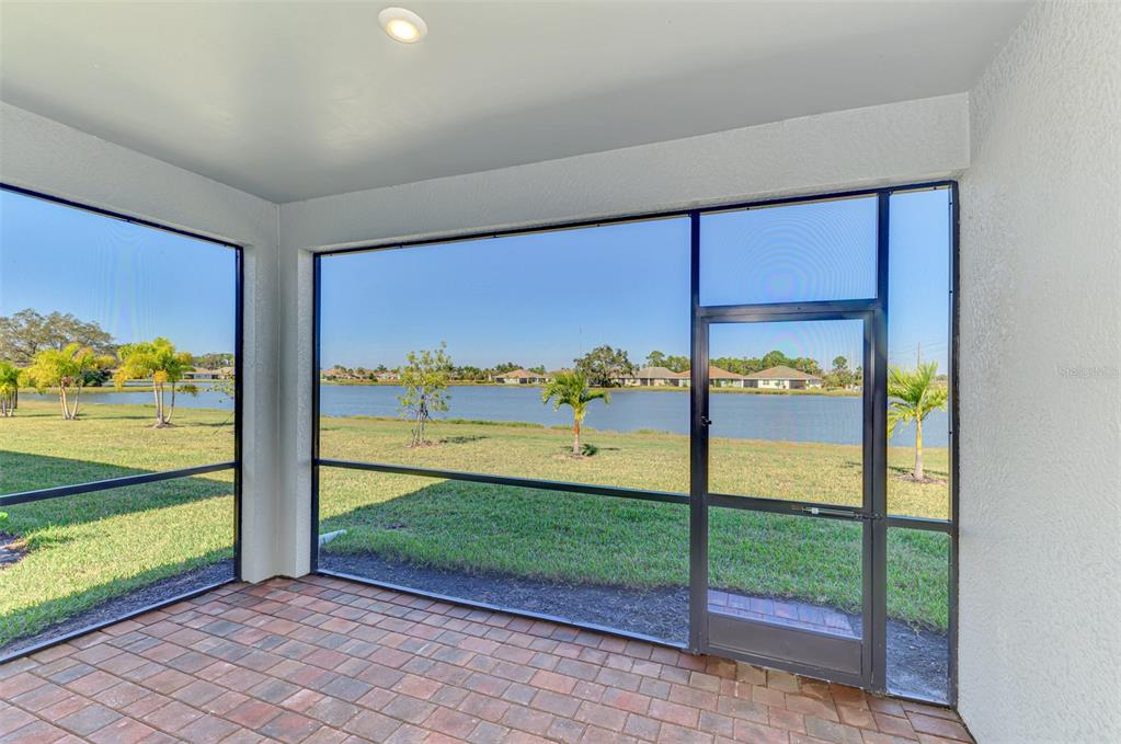 387 Ibiza Loop Venice, FL 34292 - Photo 33 of 60 a view of a room with a big yard