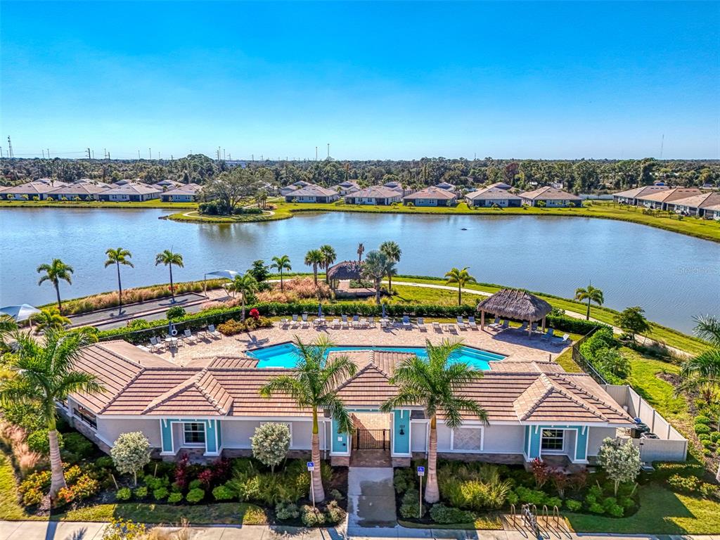 387 Ibiza Loop Venice, FL 34292 - Photo 40 of 60 an aerial view of a house with a lake view