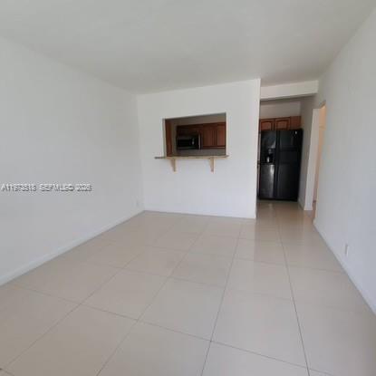 1845 Pembroke Road, Unit 322 Hollywood, FL 33020 - Photo 4 of 11 a view of a room with an empty space