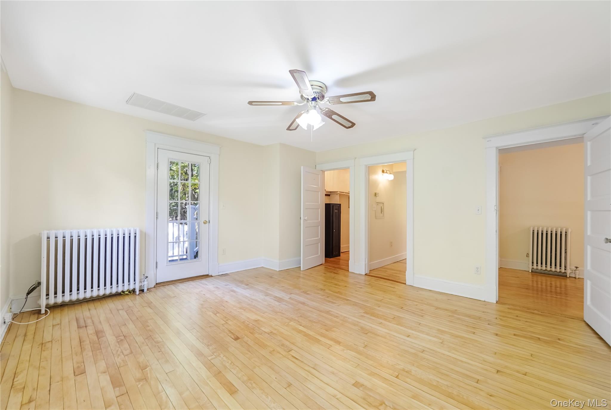 25 Whittier Road Blauvelt, NY 10913 - Photo 24 of 34 an empty room with wooden floor and ceiling fan