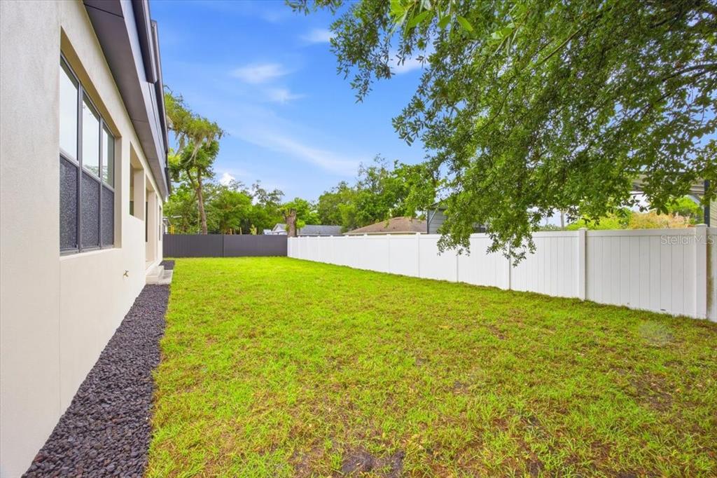 104 South Maki Road Plant City, FL 33563 - Photo 27 of 28 a view of back yard of the house