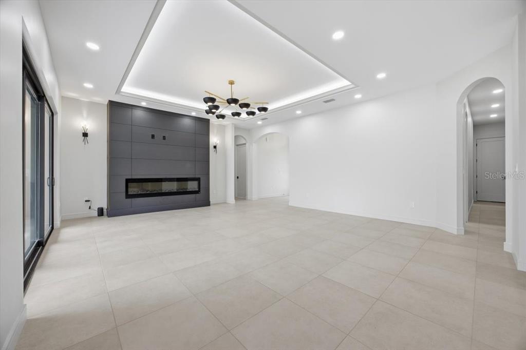 104 South Maki Road Plant City, FL 33563 - Photo 9 of 28 a view of a livingroom with a chandelier