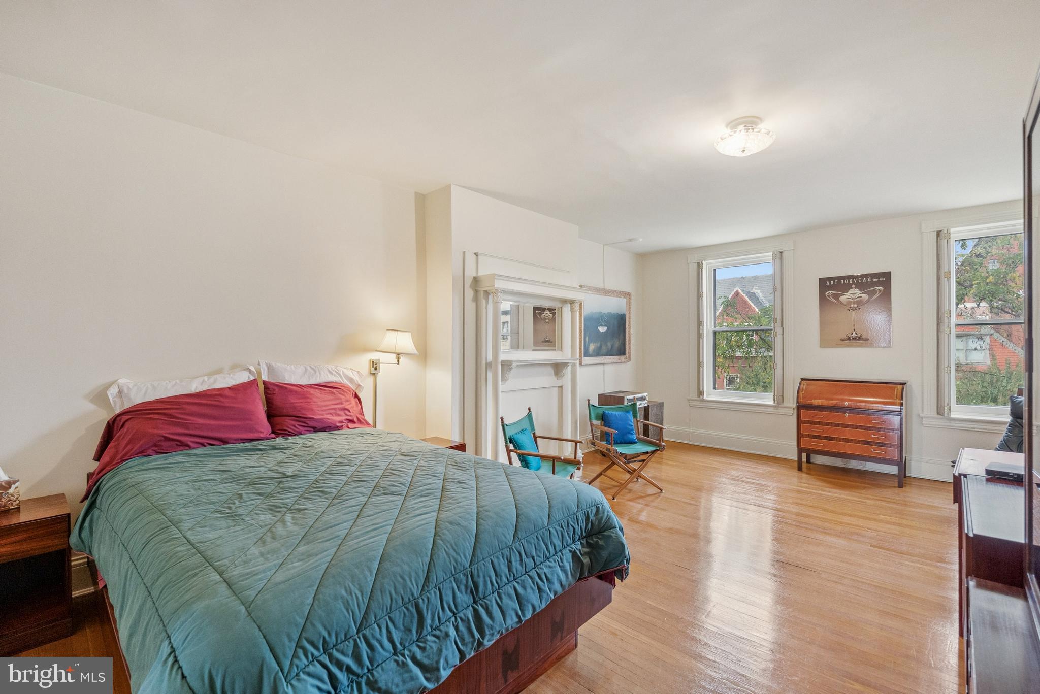 2012 R Street Northwest Washington, DC 20009 - Photo 17 of 31 a bedroom with a bed and wooden floor