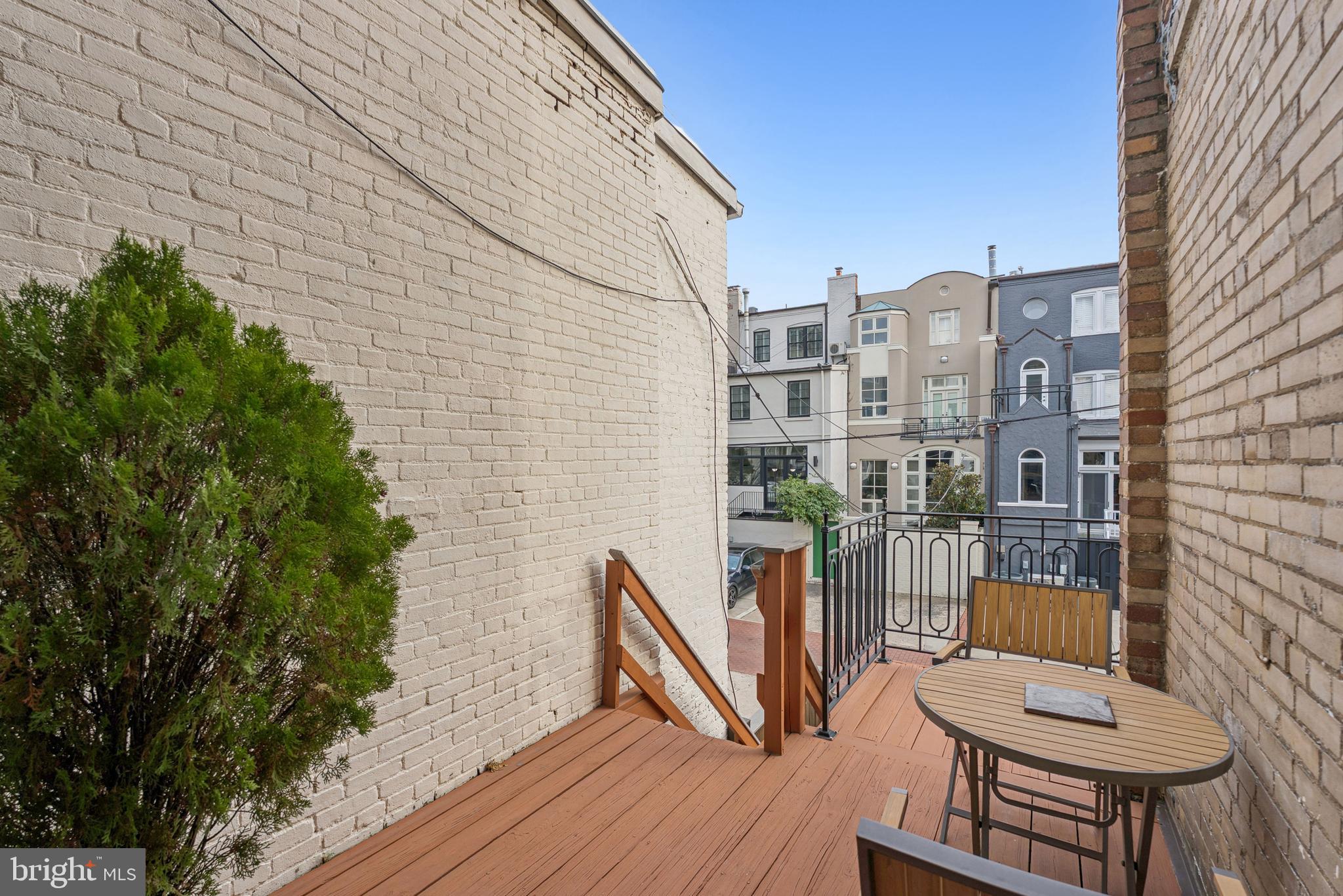 2012 R Street Northwest Washington, DC 20009 - Photo 26 of 31 a view of balcony with wooden floor and outdoor seating