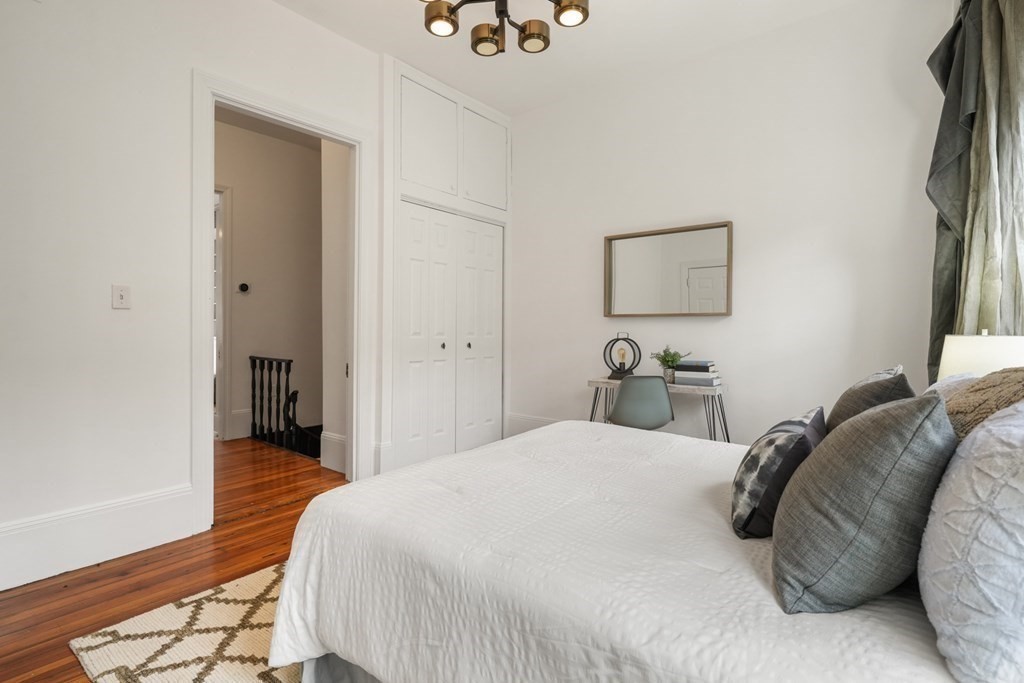 33 East Springfield Street, Unit 1 Boston, MA 02118 - Photo 18 of 31 a bedroom with a bed and a painting on the wall