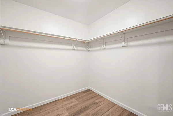 a view of an empty walk in closet