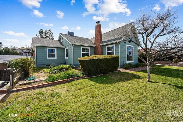 a bathroom with a bathtub shower sink vanity and toilet