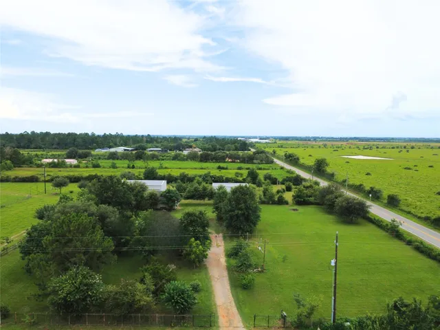 a view of a city and mountains in a big yard