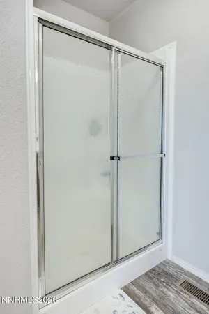 a bed room with a bed and a couch