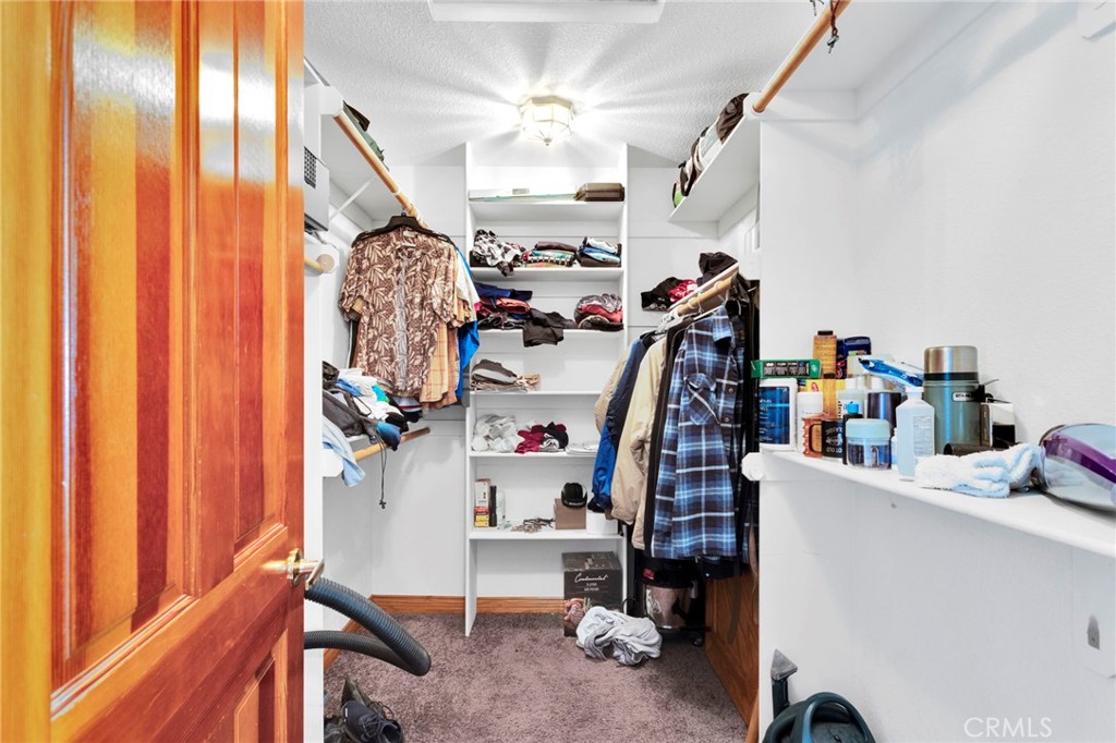 10276 Aster Road Oak Hills, CA 92344 - Photo 29 of 67 Master walk-in closet