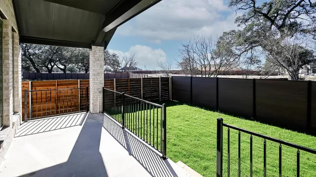 a view of house with yard and entertaining space