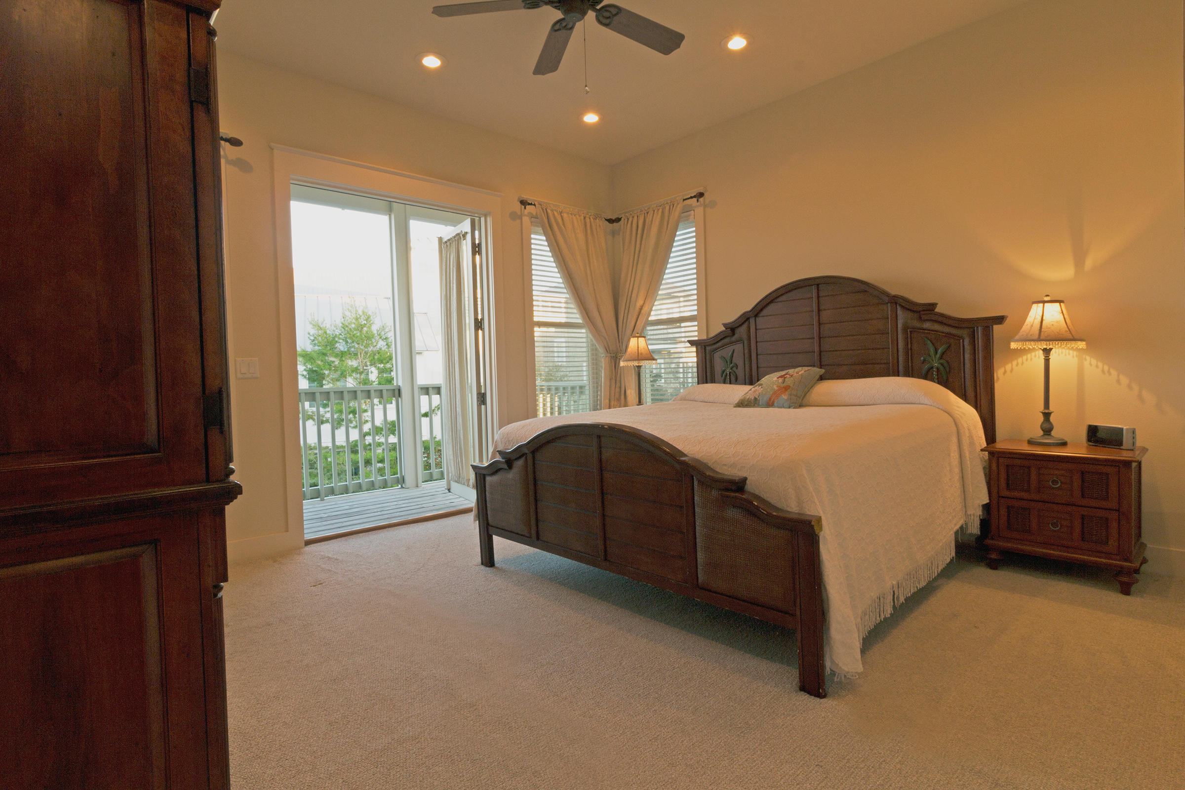 10 Chelsea Loop Road Santa Rosa Beach, FL 32459 - Photo 14 of 28 a spacious bedroom with a bed and a dresser next to a window
