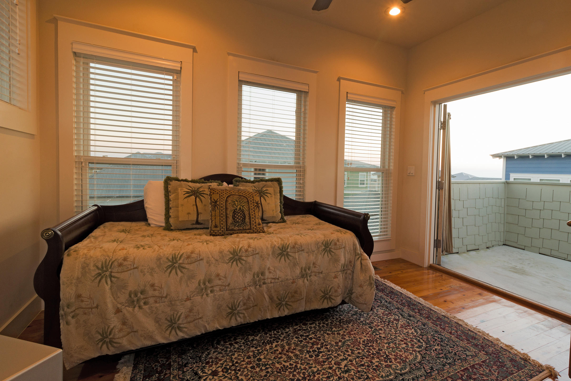 10 Chelsea Loop Road Santa Rosa Beach, FL 32459 - Photo 24 of 28 a bedroom with a bed and wooden floor
