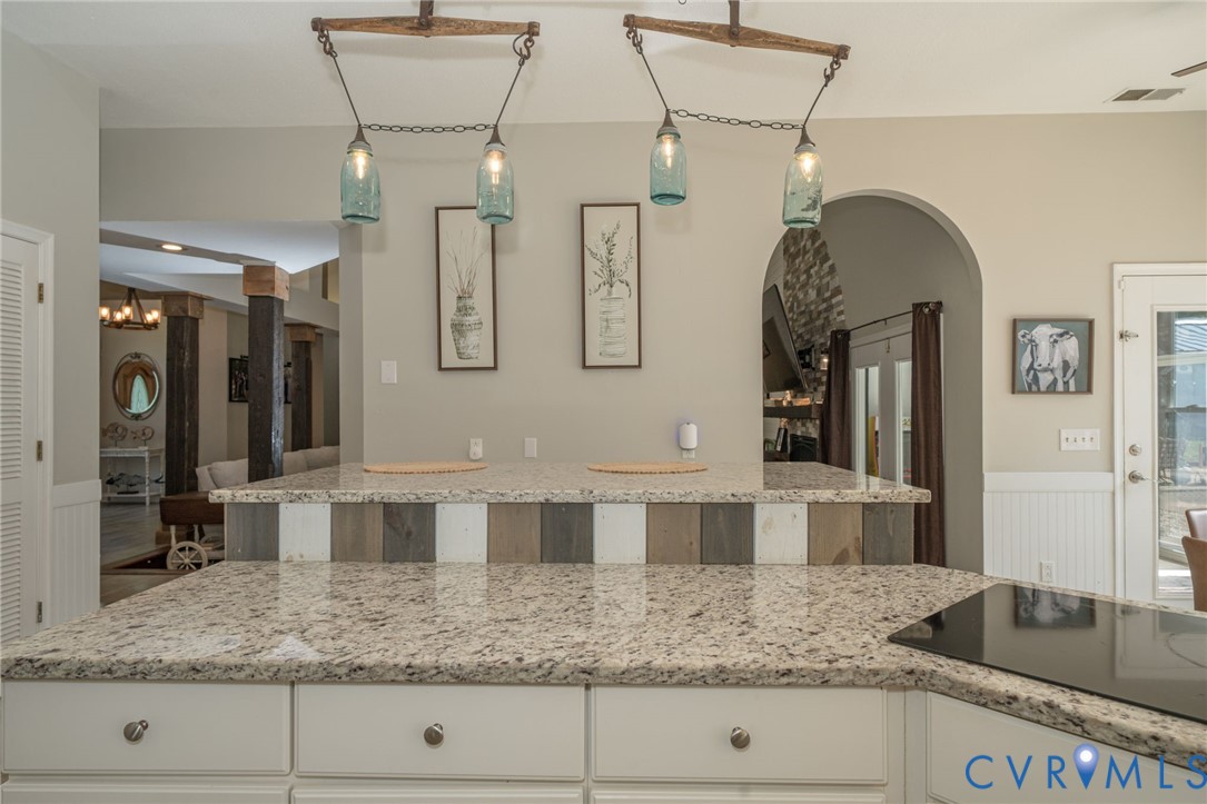 12700 Coalboro Road Chesterfield, VA 23838 - Photo 14 of 50 Kitchen featuring speckled countertops, white cabi