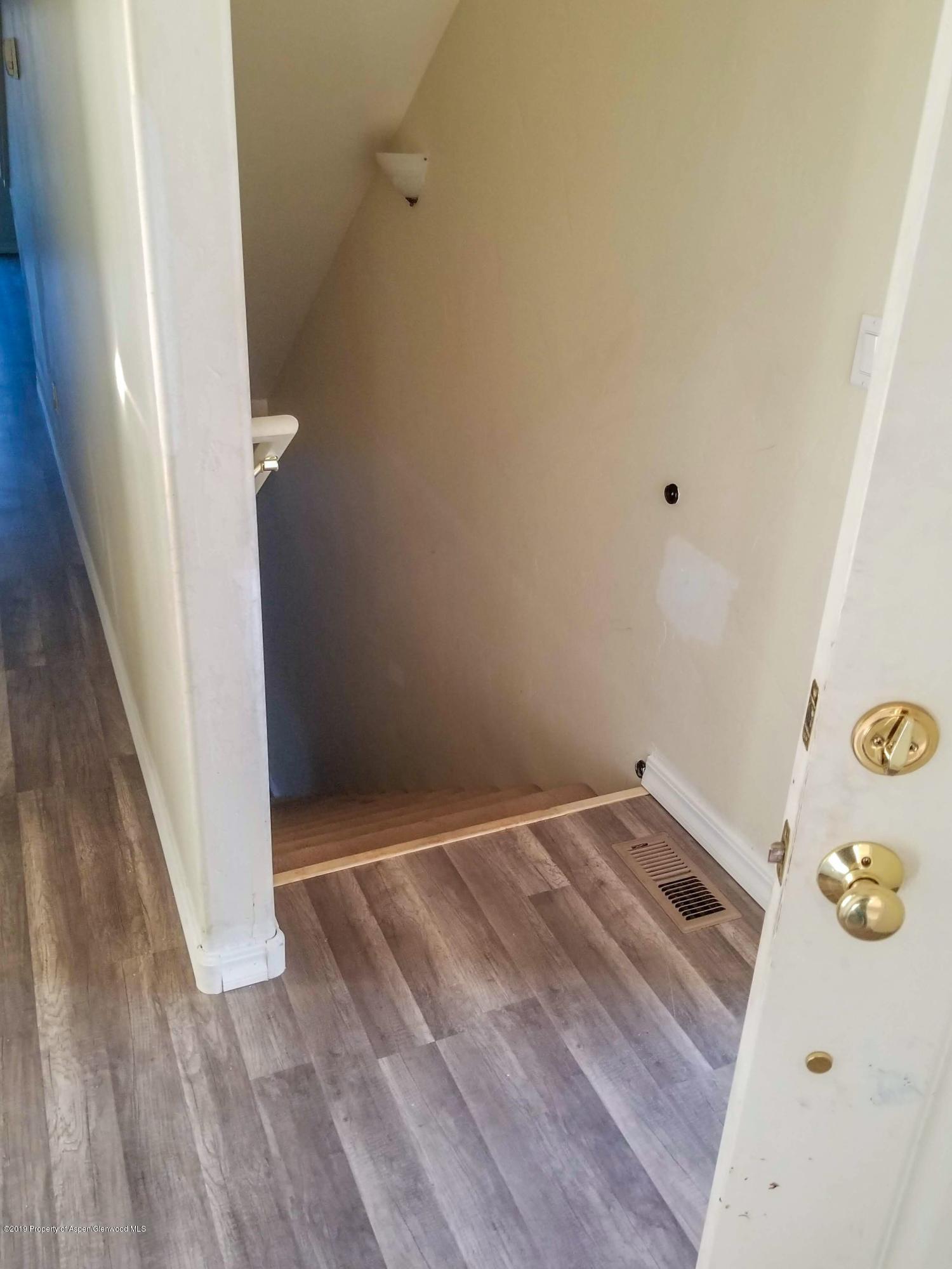 1016 East Avenue, Unit 4 Rifle, CO 81650 - Photo 5 of 12 stairway to walkout