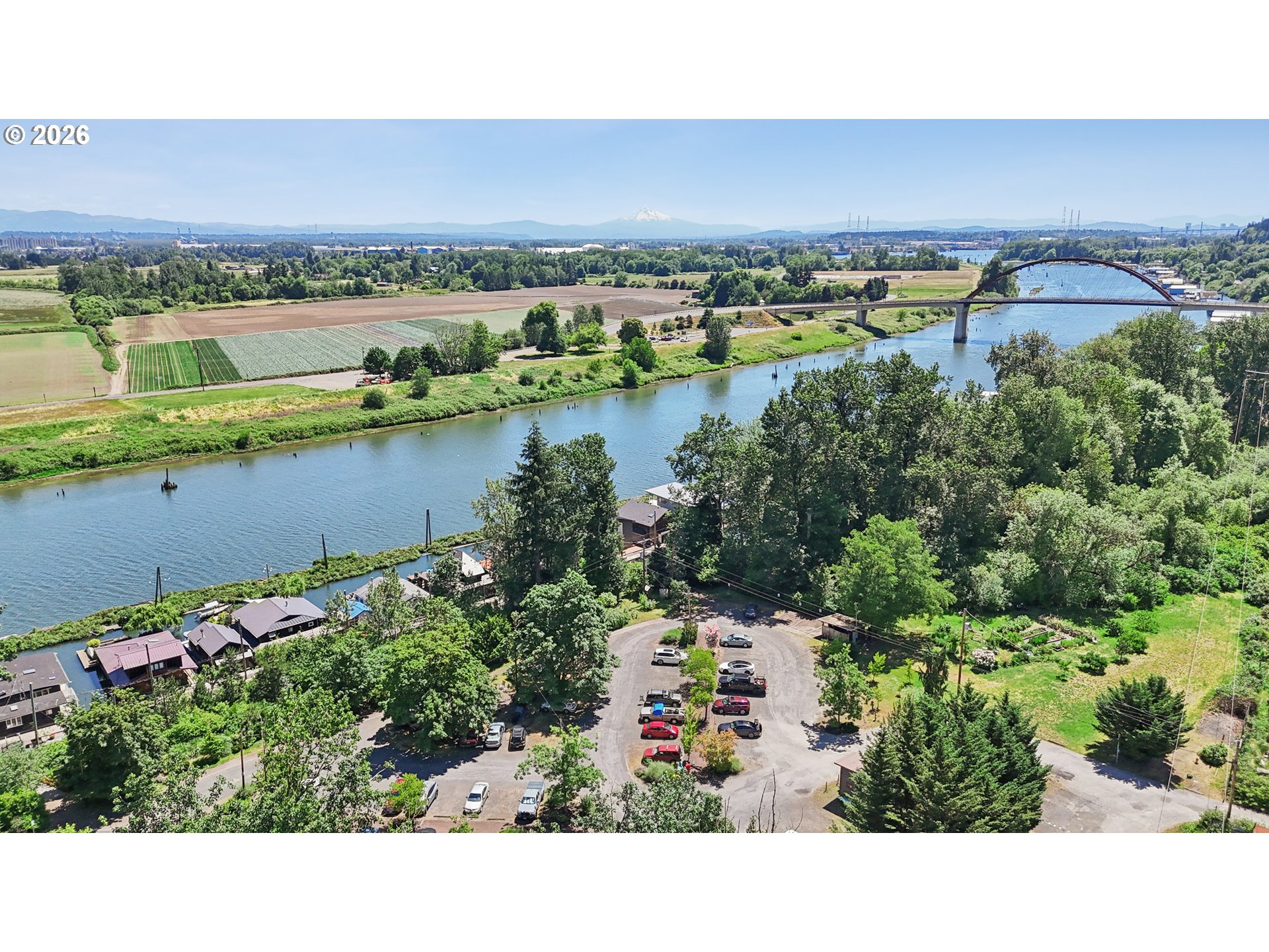 14936 Northwest Mill Road, Unit K Portland, OR 97231 - Photo 32 of 33 an aerial view of a house with a lake view