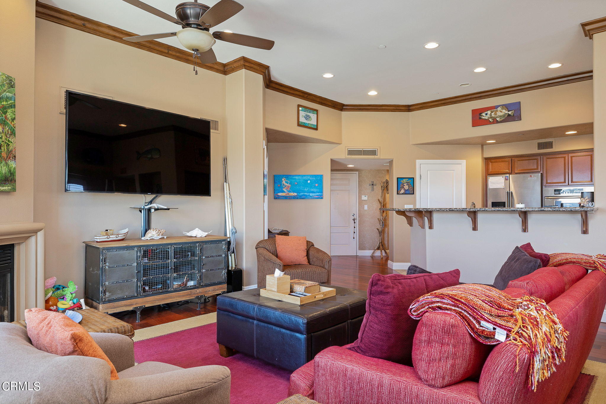 4288 Tradewinds Drive Oxnard, CA 93035 - Photo 11 of 42 a living room with furniture and a flat screen tv