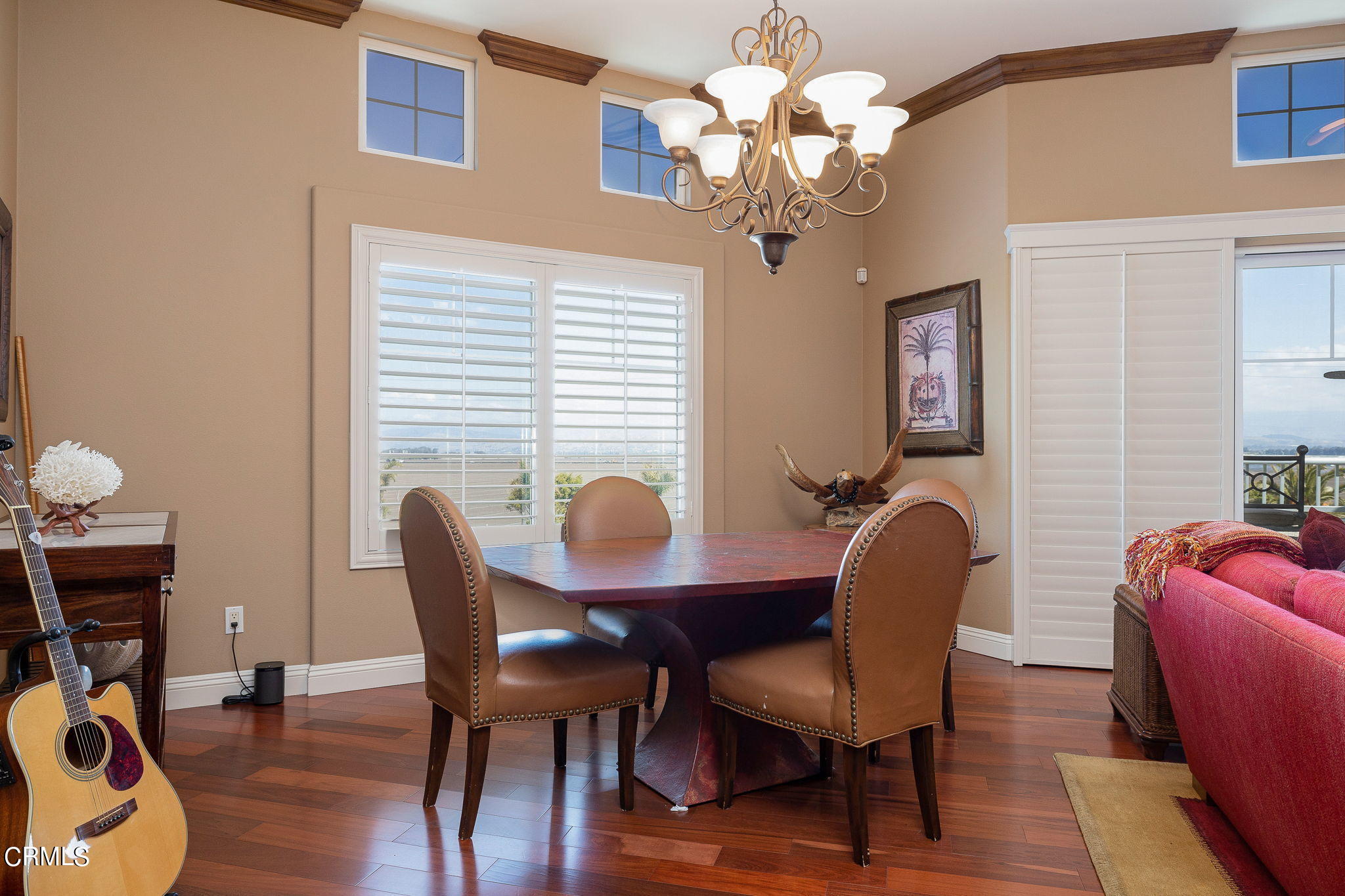 4288 Tradewinds Drive Oxnard, CA 93035 - Photo 15 of 42 a view of a dining room with furniture and chandelier