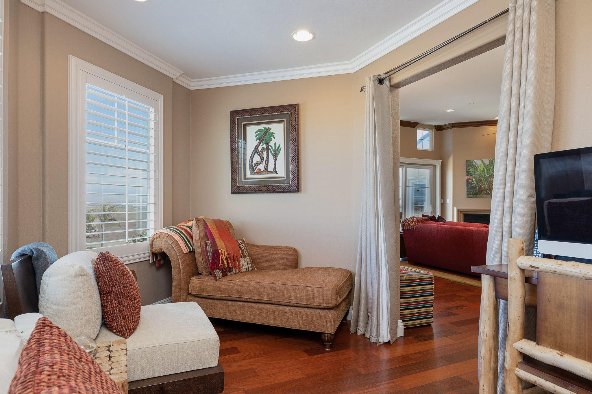 4288 Tradewinds Drive Oxnard, CA 93035 - Photo 18 of 42 a living room with furniture and a flat screen tv
