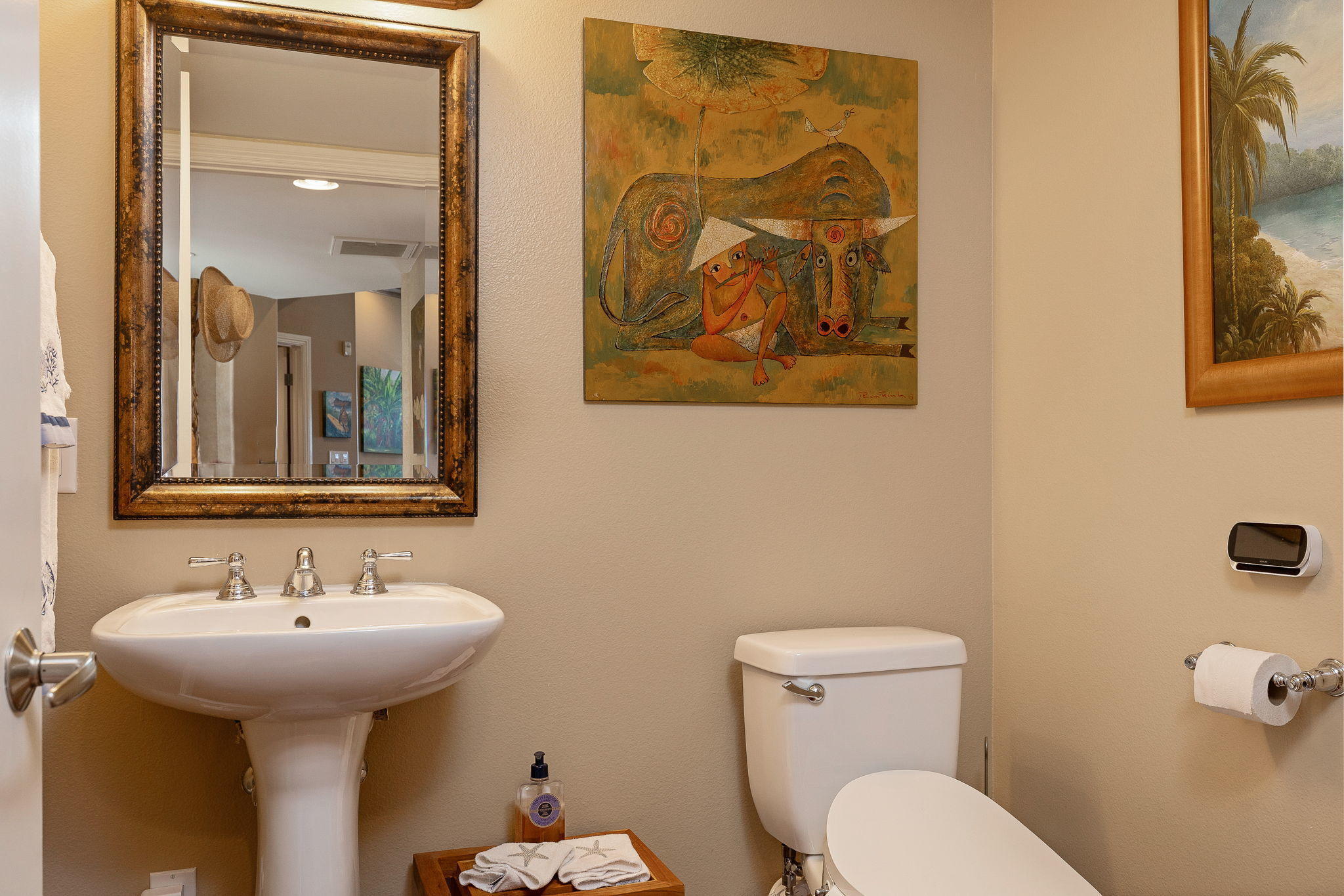 4288 Tradewinds Drive Oxnard, CA 93035 - Photo 19 of 42 a bathroom with a toilet sink and mirror