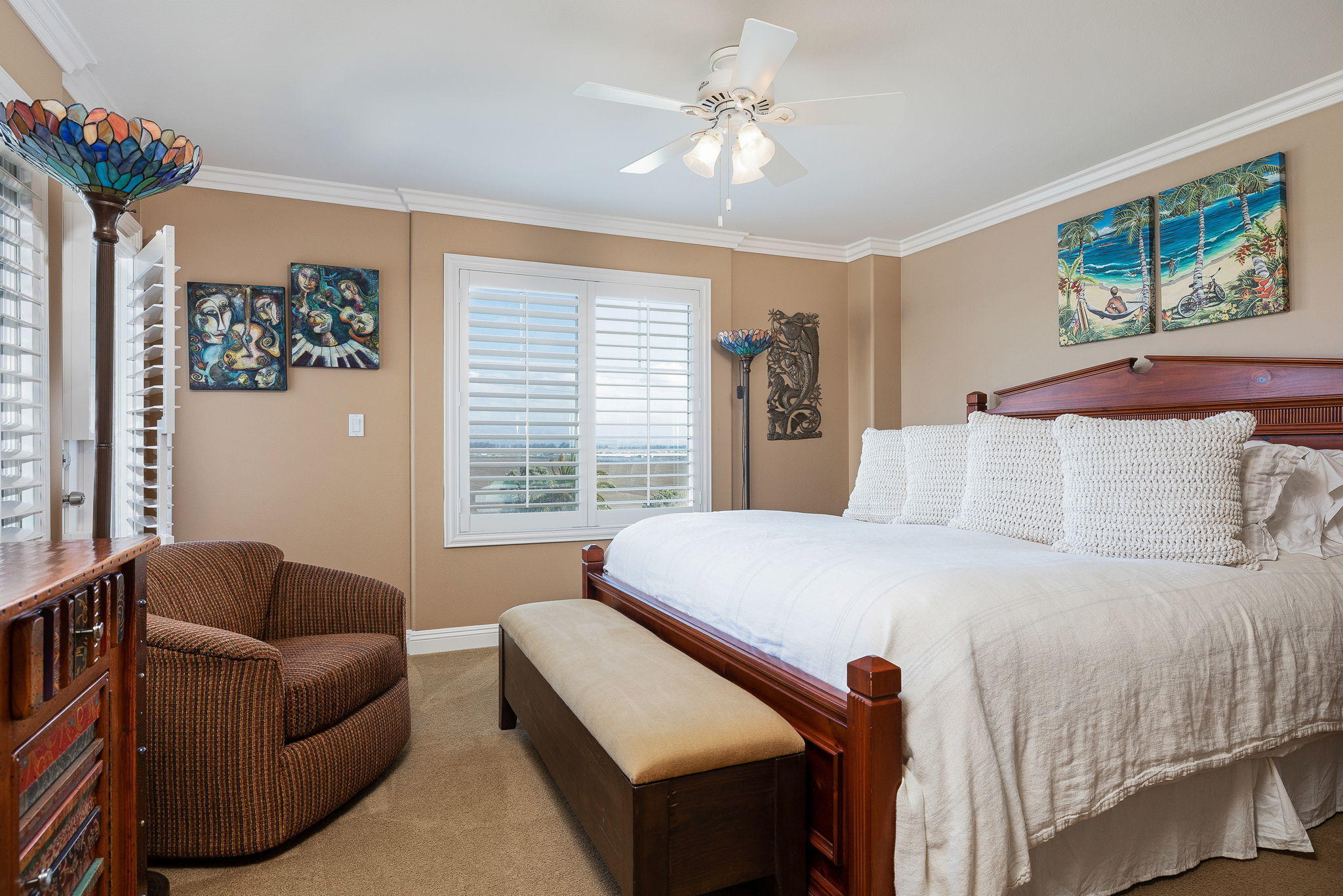 4288 Tradewinds Drive Oxnard, CA 93035 - Photo 20 of 42 a bedroom with a bed a couch and a window