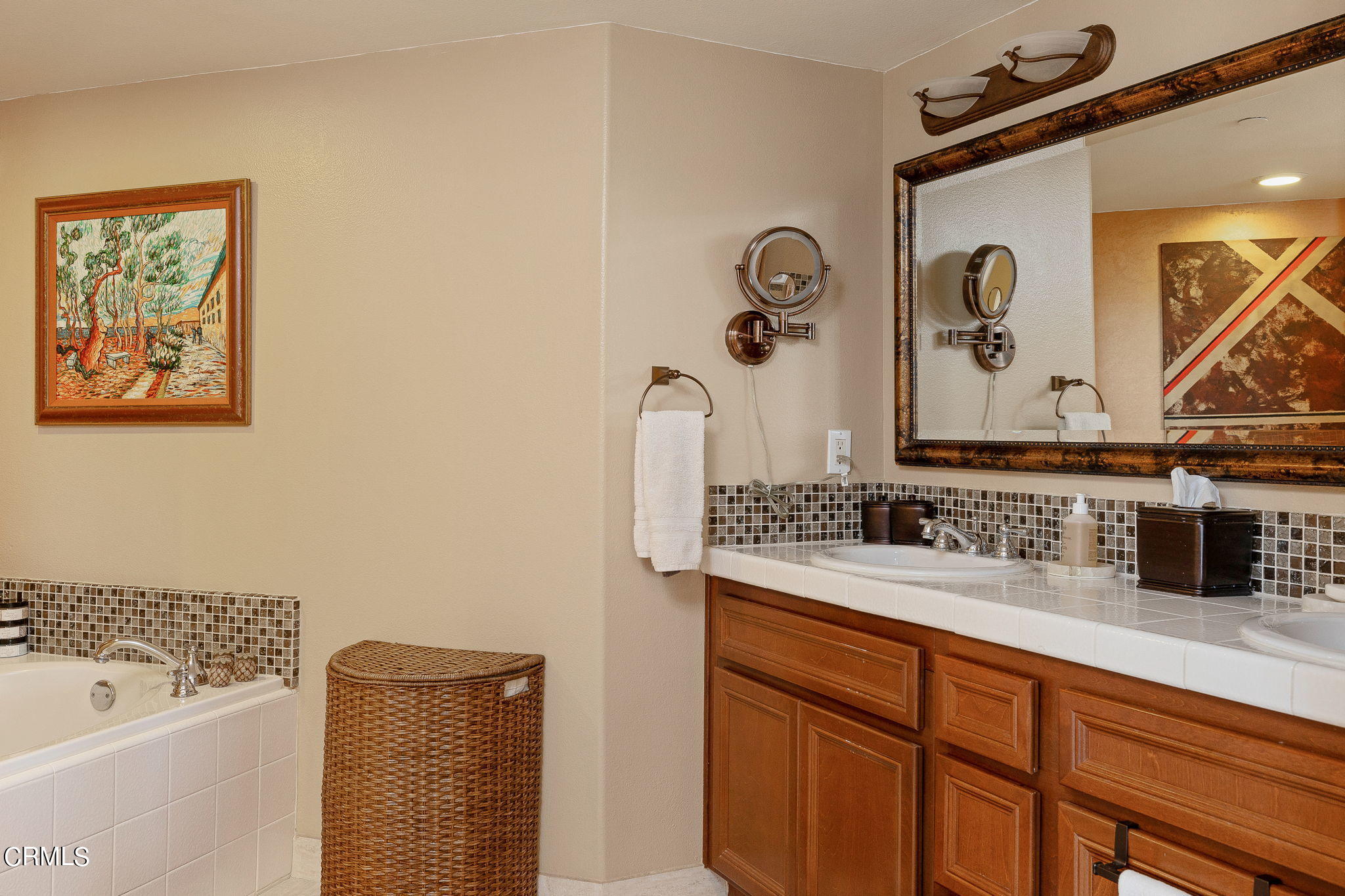 4288 Tradewinds Drive Oxnard, CA 93035 - Photo 23 of 42 a bathroom with a bathtub and a sink