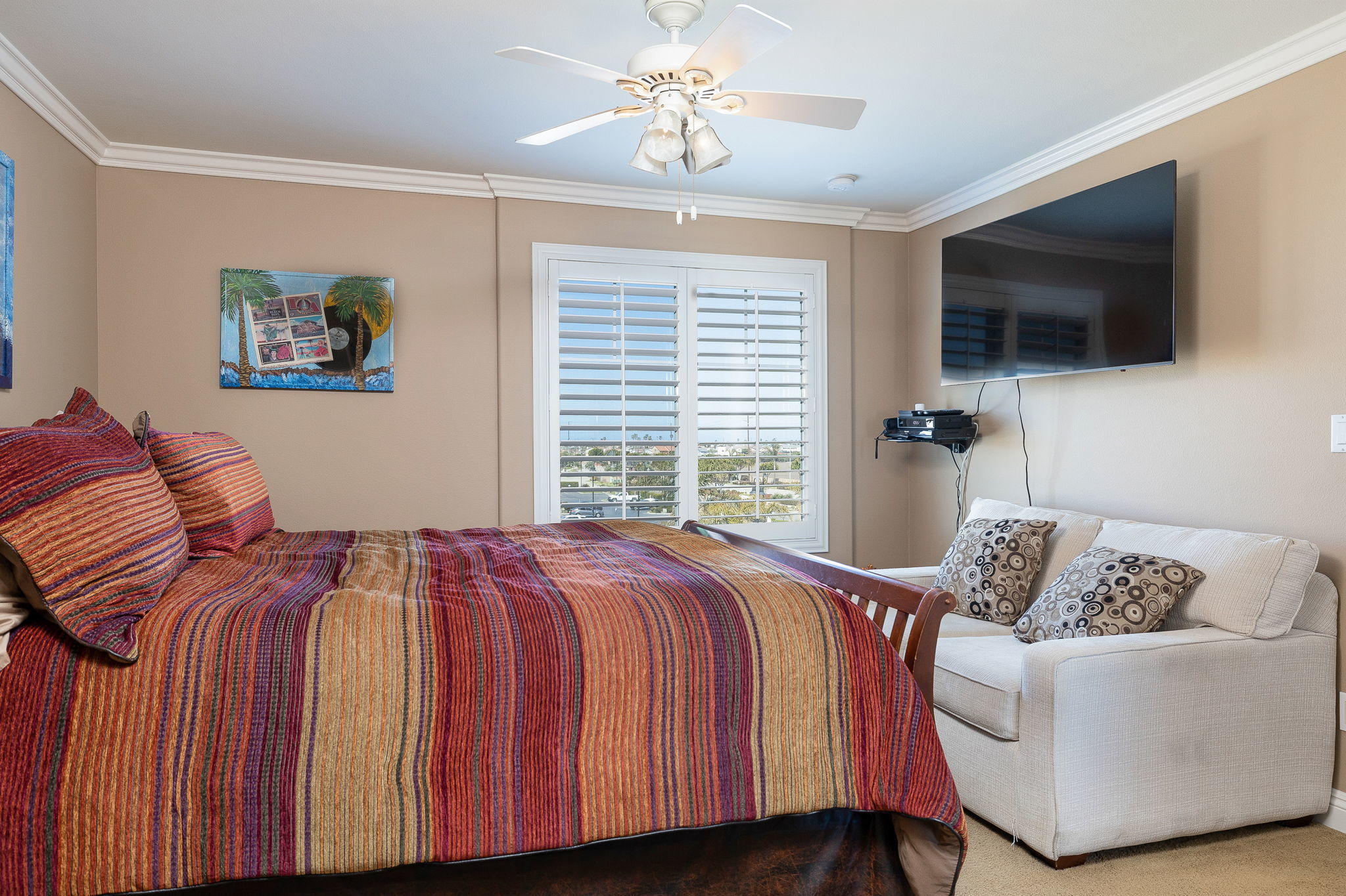 4288 Tradewinds Drive Oxnard, CA 93035 - Photo 29 of 42 a bedroom with a bed and a flat screen tv