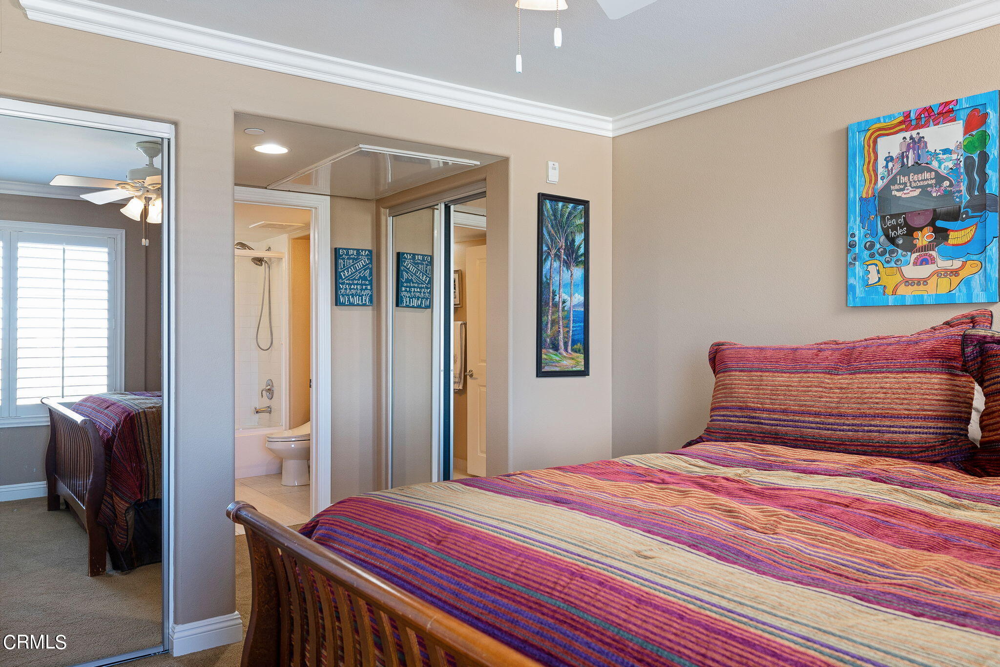 4288 Tradewinds Drive Oxnard, CA 93035 - Photo 30 of 42 a bedroom with a bed and wooden floor