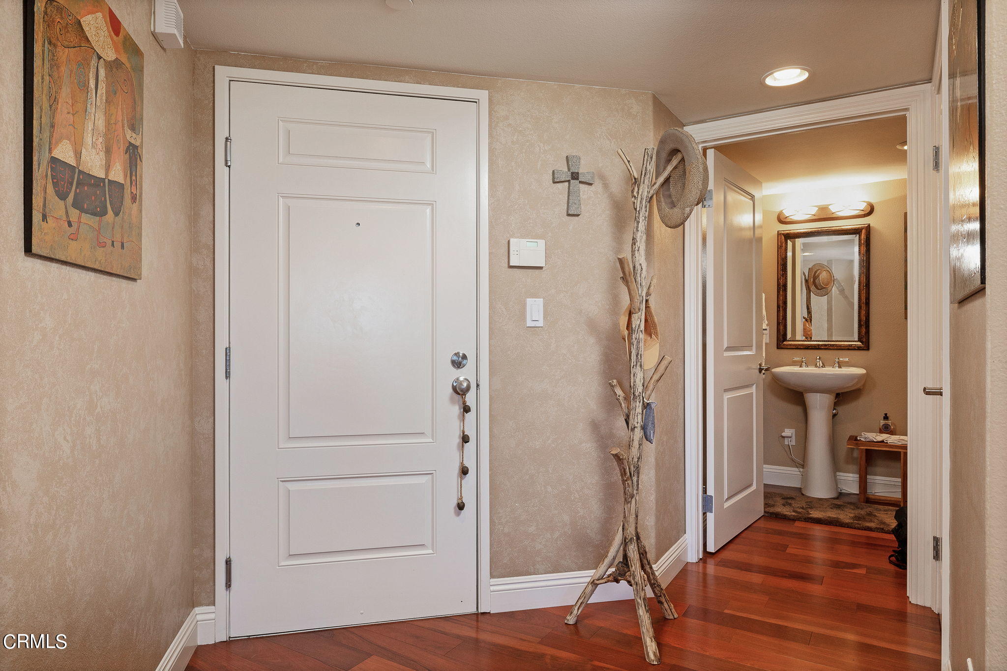 4288 Tradewinds Drive Oxnard, CA 93035 - Photo 7 of 42 a view of a bathroom with a glass door and a bathroom
