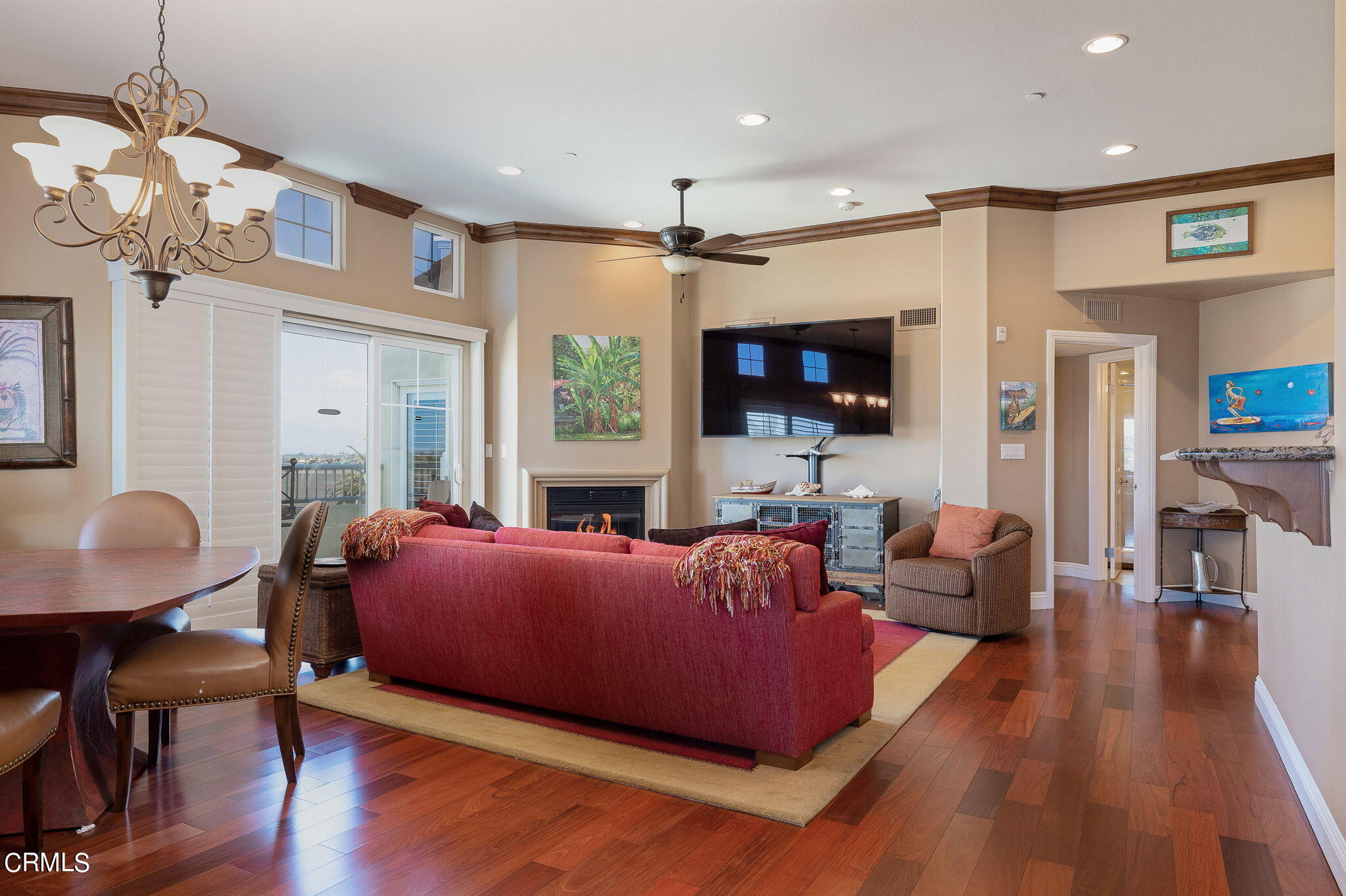4288 Tradewinds Drive Oxnard, CA 93035 - Photo 10 of 42 a living room with furniture wooden floor and a flat screen tv
