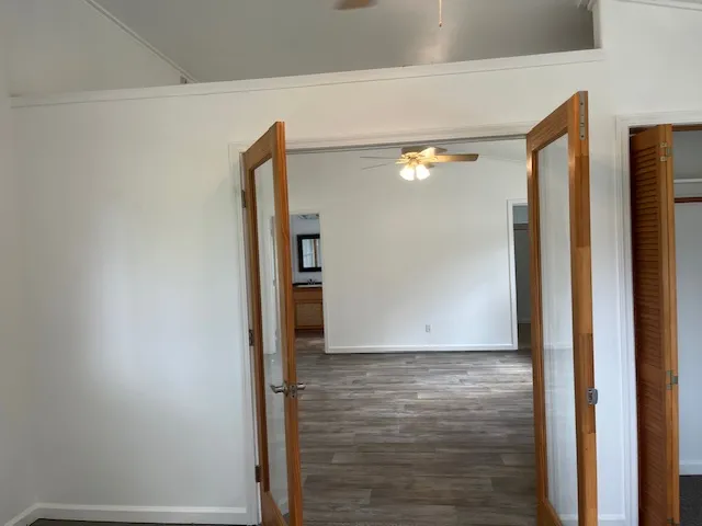 an empty room with a mirror