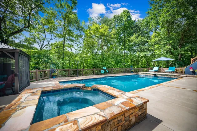 a view of balcony with furniture