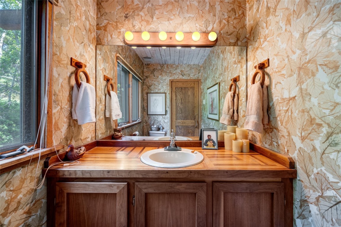 2350 Glacier Ridge Steamboat Springs, CO 80487 - Photo 19 of 47 a bathroom with a sink and a mirror