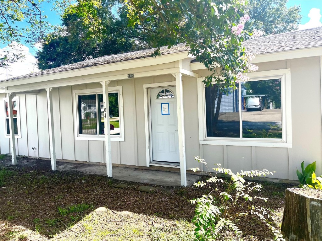 104 Peach Street Tomball, TX 77375 - Photo 3 of 19 a front view of a house