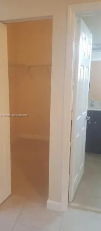 a view of a small space with window and a bathroom