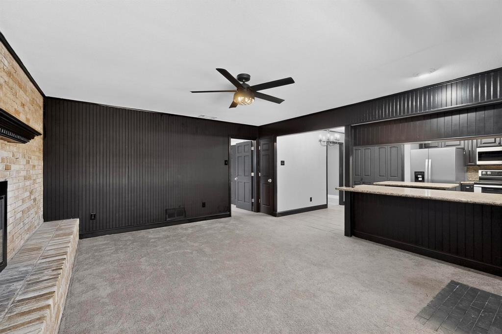 3675 Rickshaw Drive, Unit 3671 Dallas, TX 75229 - Photo 8 of 32 Updated Family Room with Fireplace