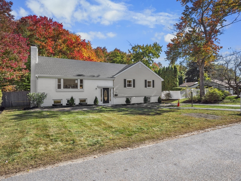 33 Fox Hill Road Framingham, MA 01701 - Photo 31 of 34 a view of a house with a swimming pool and a yard