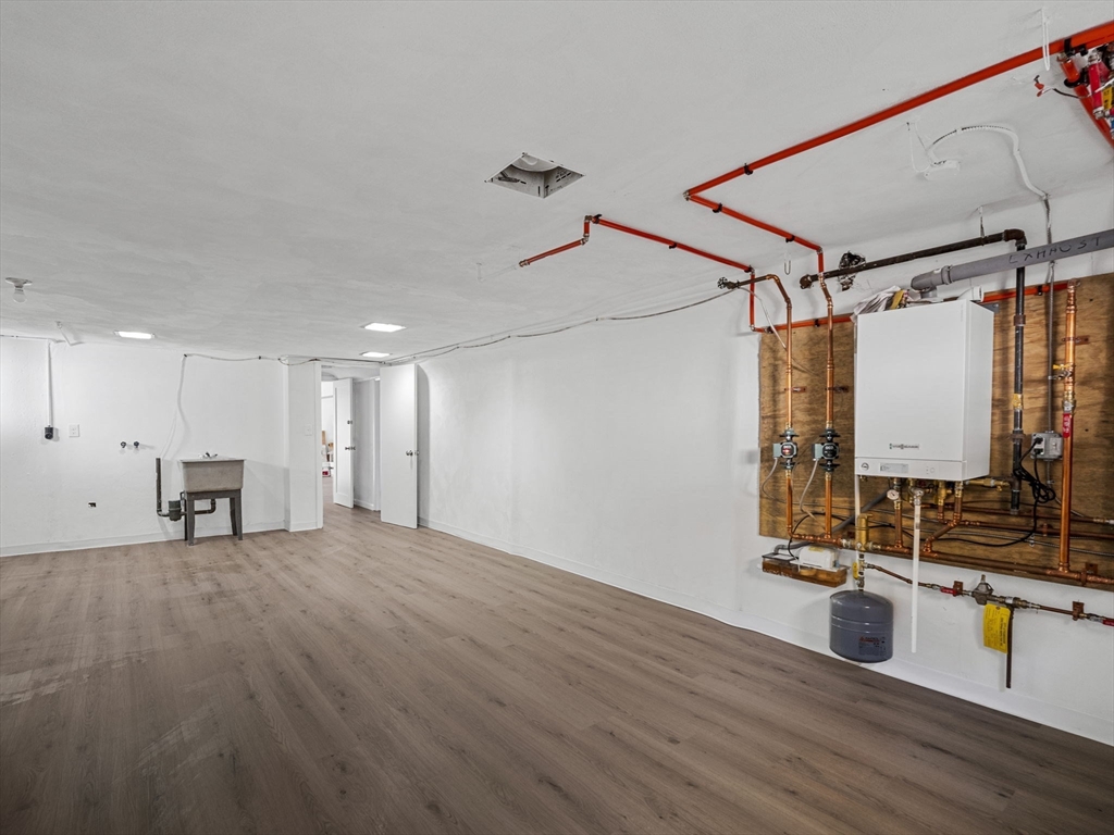 33 Fox Hill Road Framingham, MA 01701 - Photo 33 of 34 a view of a room with wooden floor