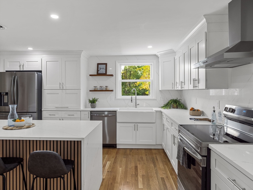 33 Fox Hill Road Framingham, MA 01701 - Photo 4 of 34 a kitchen with a sink appliances and cabinets