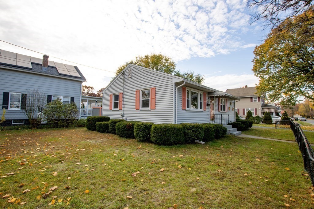 146 Davis Street Springfield, MA 01104 - Photo 14 of 15 a view of a yard in front of a house