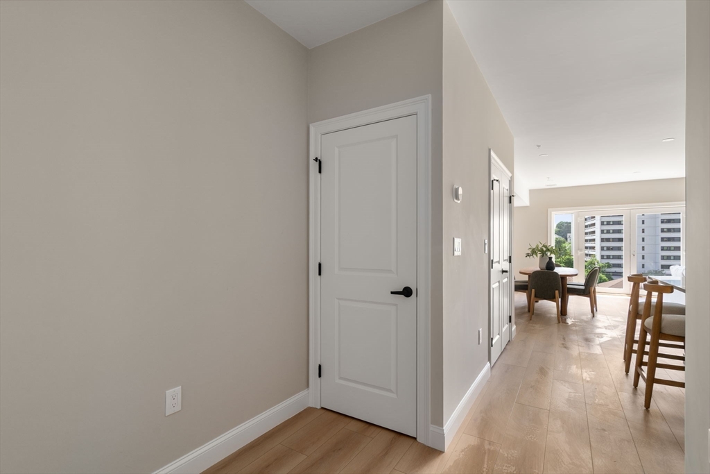 13 Wentworth Road, Unit 404 Quincy, MA 02170 - Photo 15 of 18 a view of a livingroom with furniture and hardwood floor