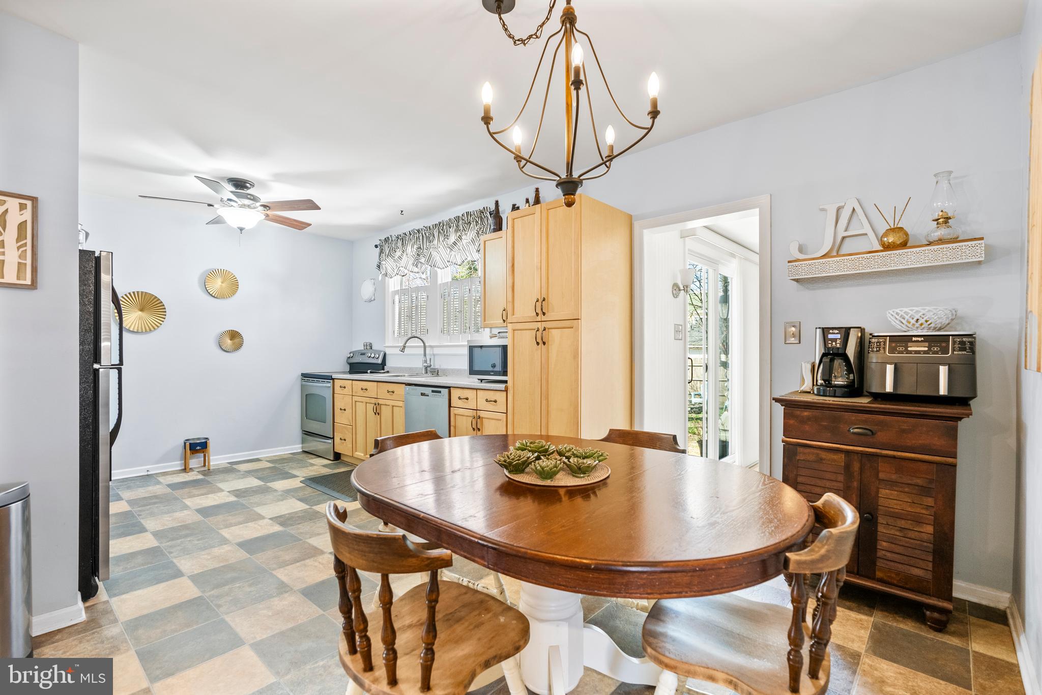 41 Pine Street Beverly, NJ 08010 - Photo 13 of 31 a dining room with furniture and window