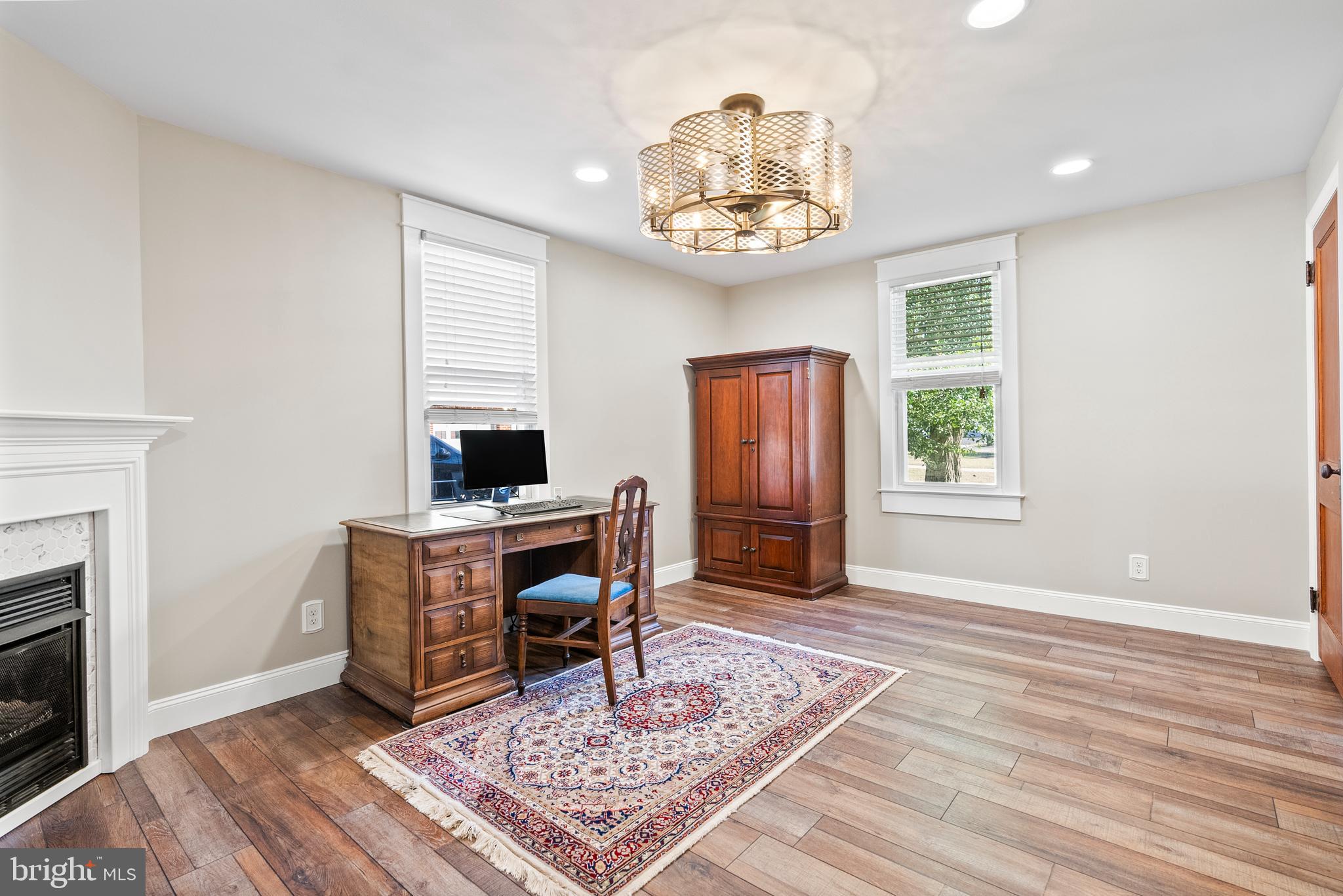41 Pine Street Beverly, NJ 08010 - Photo 16 of 31 a view of a livingroom with furniture and a fireplace