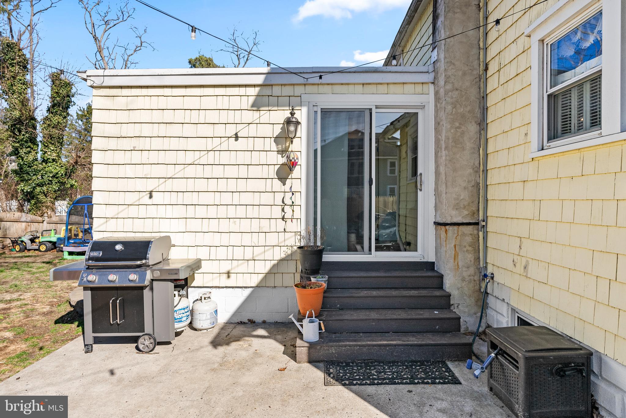41 Pine Street Beverly, NJ 08010 - Photo 30 of 31 a view of a patio with table and chairs