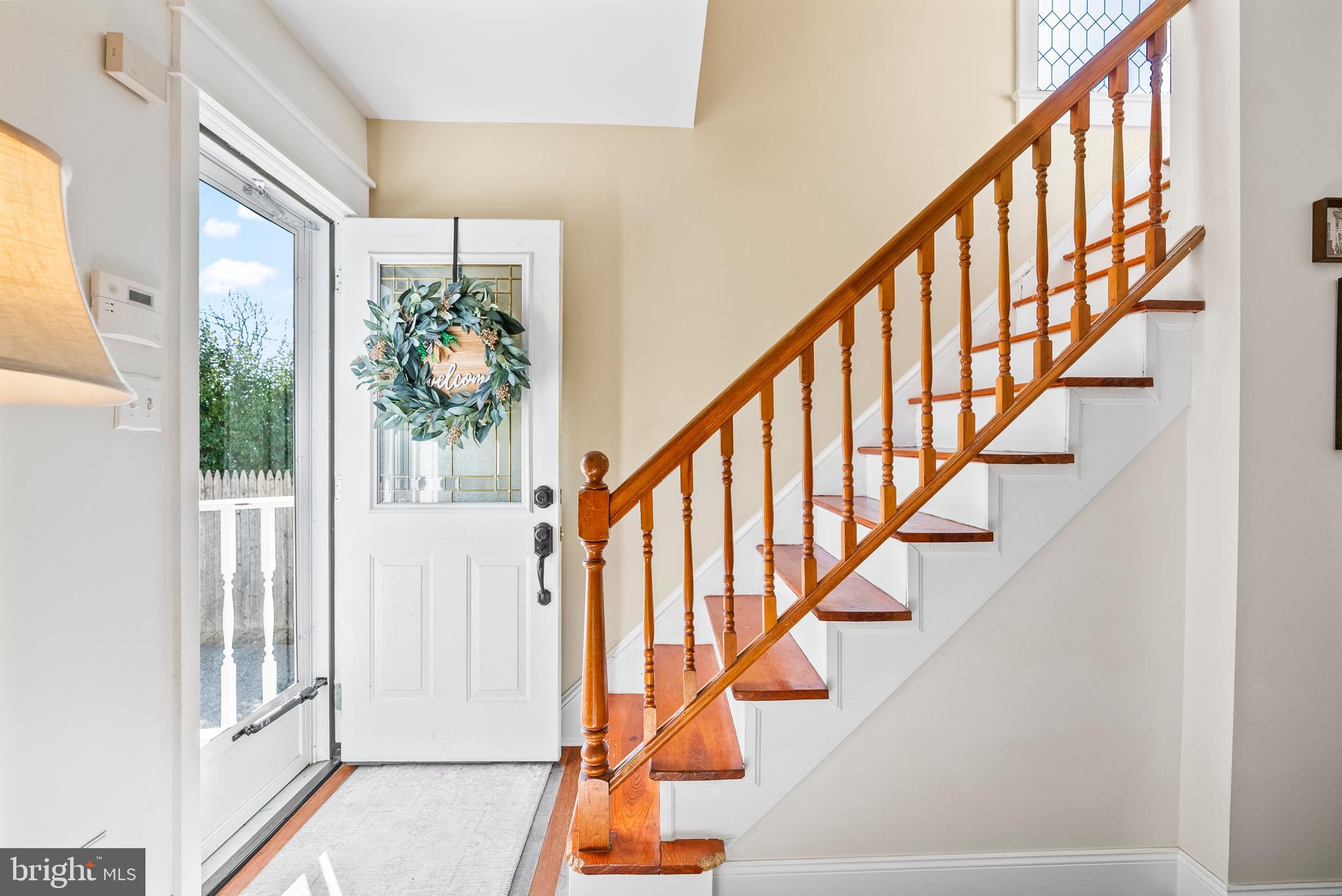41 Pine Street Beverly, NJ 08010 - Photo 5 of 31 a view of entryway with wooden floor and stairs
