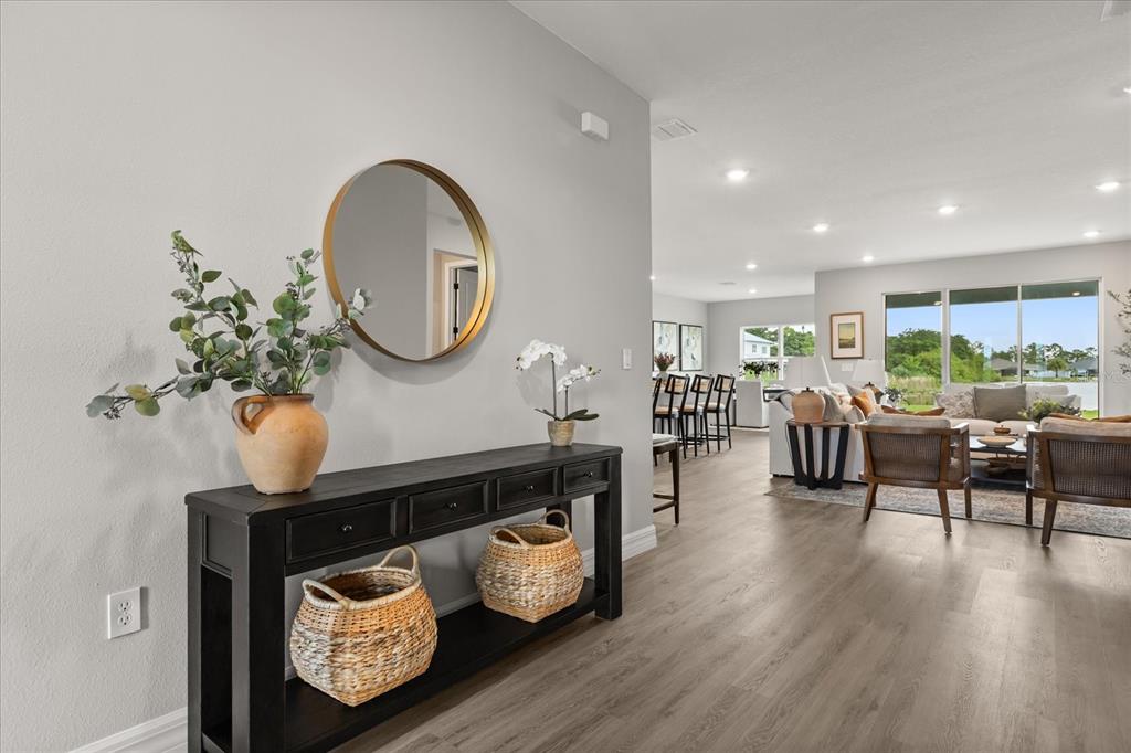 25 Freesia Court Homosassa, FL 34446 - Photo 3 of 30 a living room with furniture and a large window