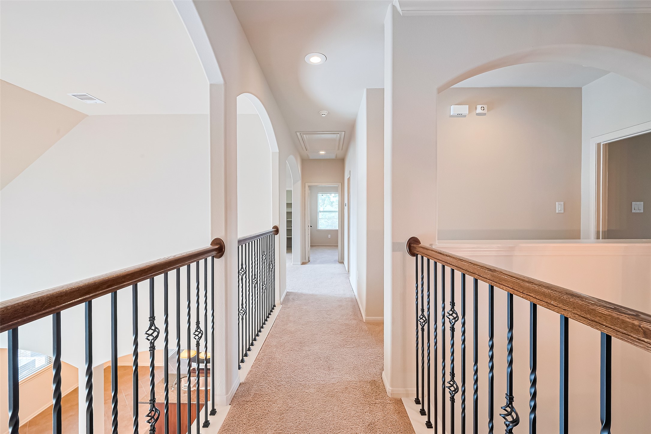 19 Sandwell Place Spring, TX 77389 - Photo 30 of 50 Open walkway with architectural interest.